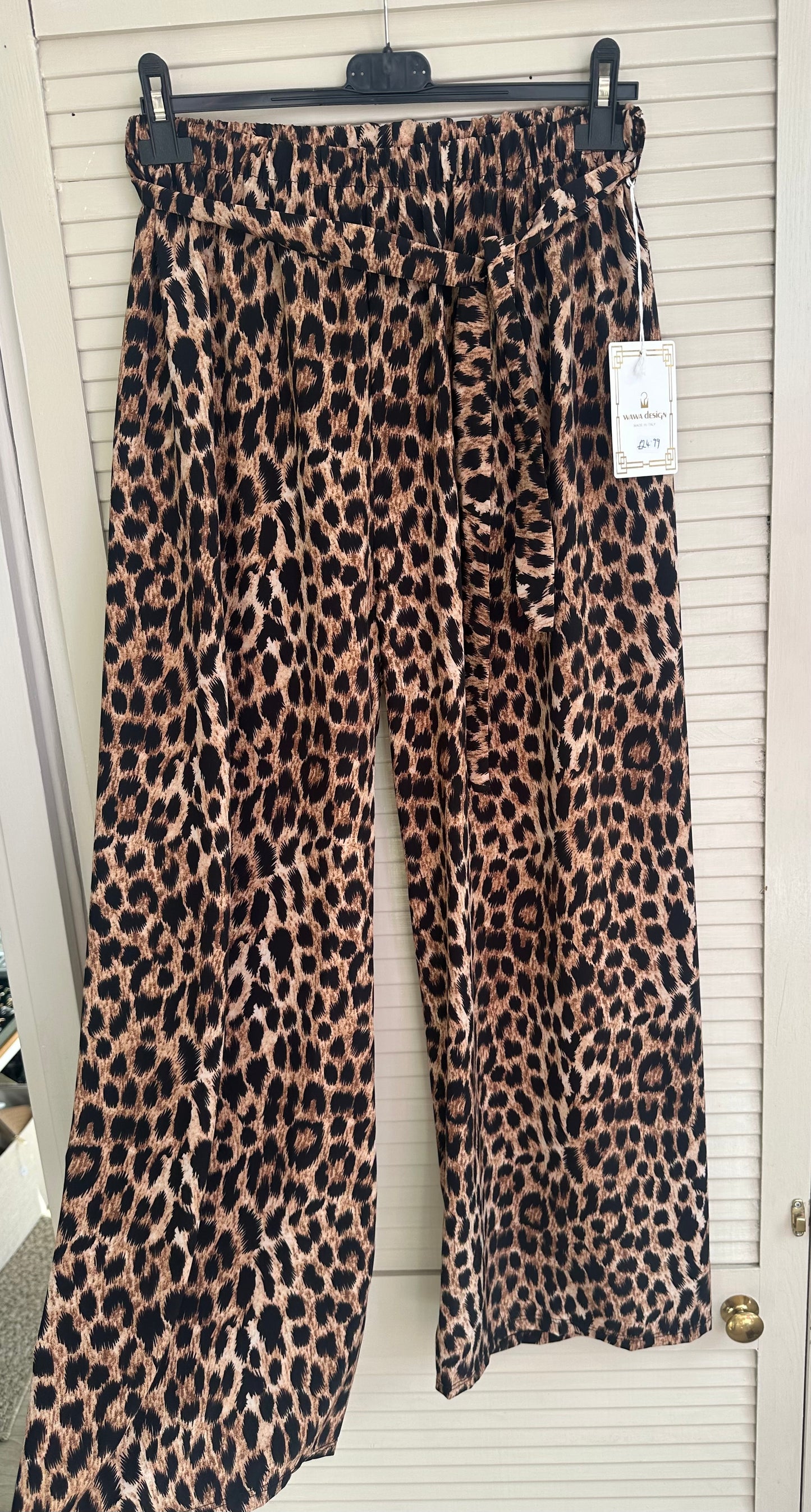 Curve fit leopard print elasticated trousers