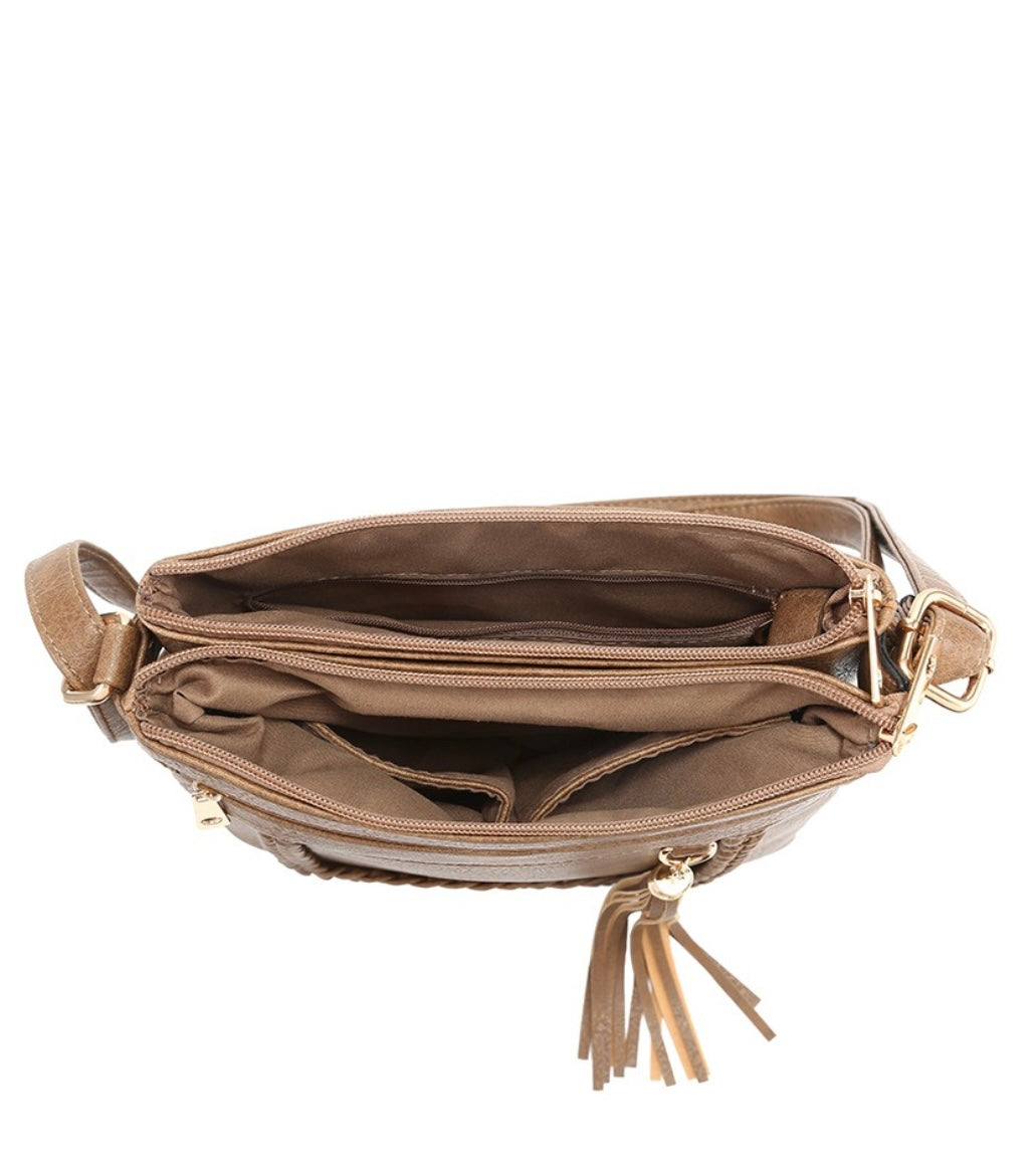 Red crossbody bag with tassel pendant detail