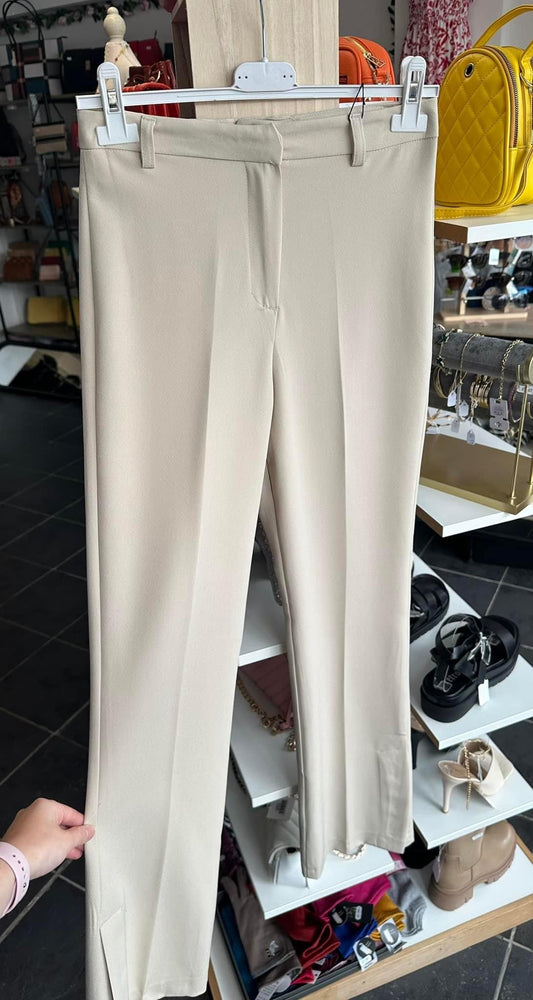 Cream high waisted split hem trousers