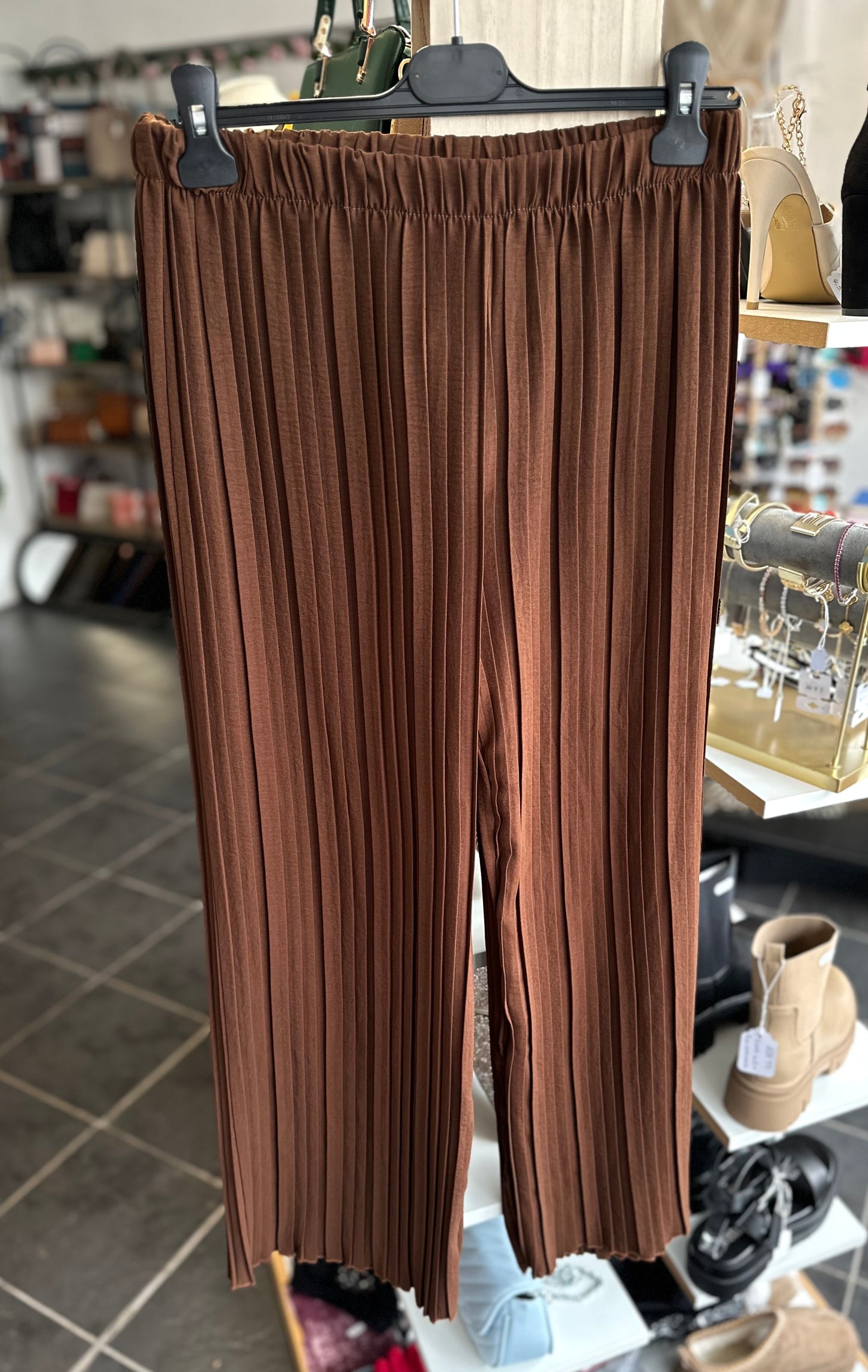 Brown pleated trousers