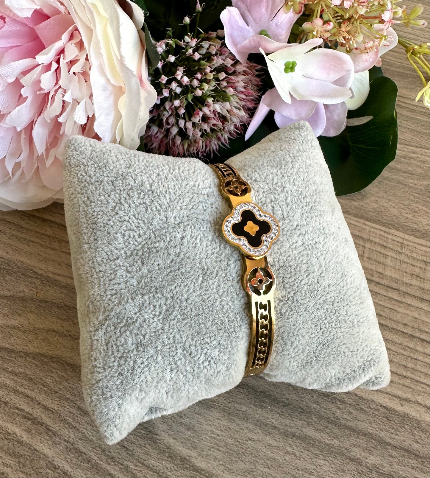 Black petal gold plated bangle