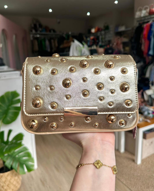 Gold studded crossbody bag with gold chain strap