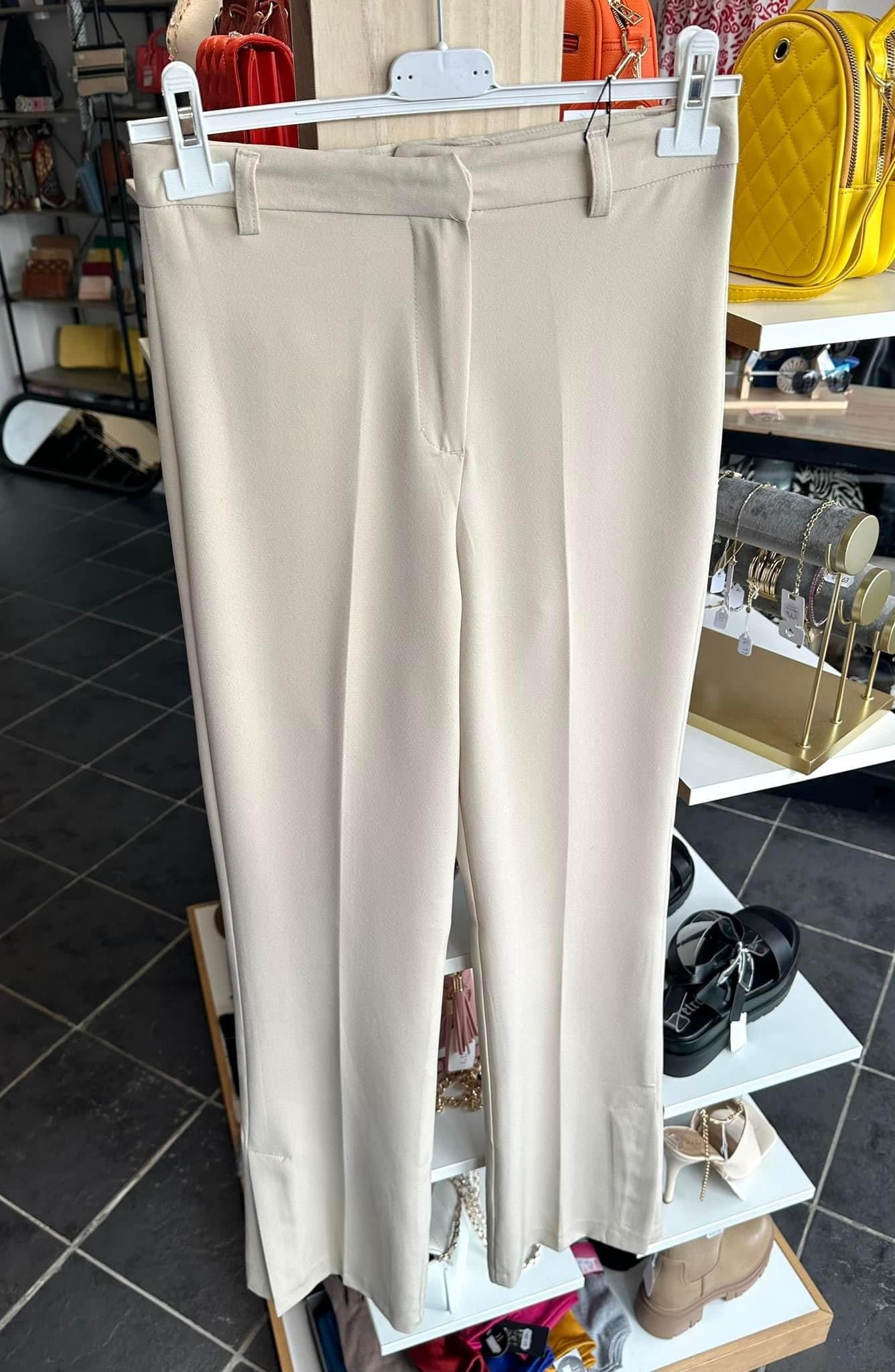 Cream high waisted split hem trousers