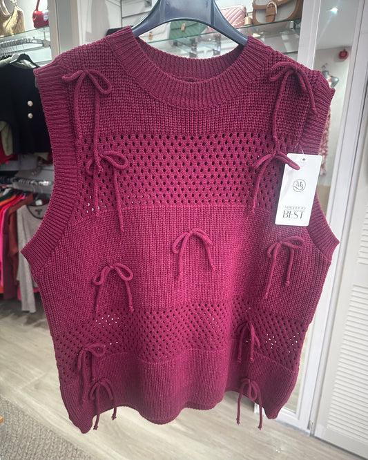 Burgundy knitted sweater vest with bow detail
