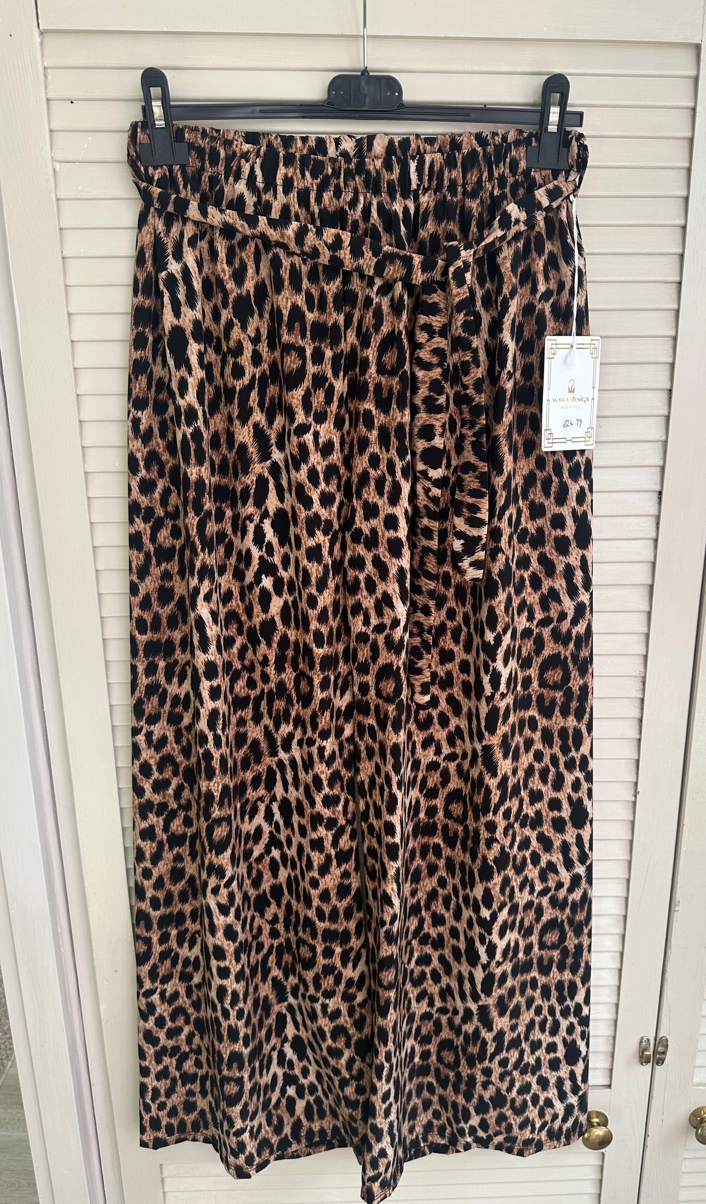 Curve fit leopard print elasticated trousers