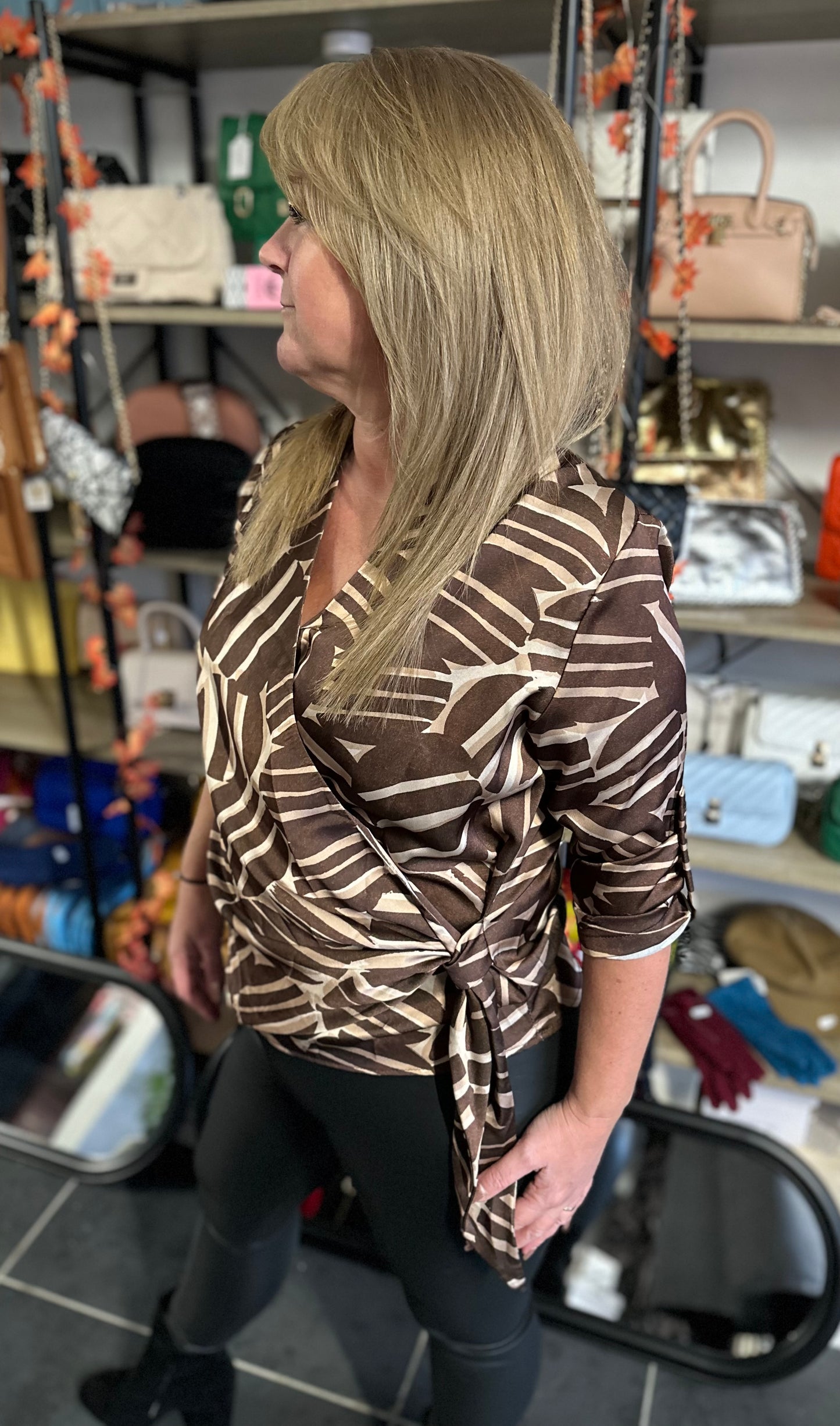 Brown patterned rolled sleeve tie blouse