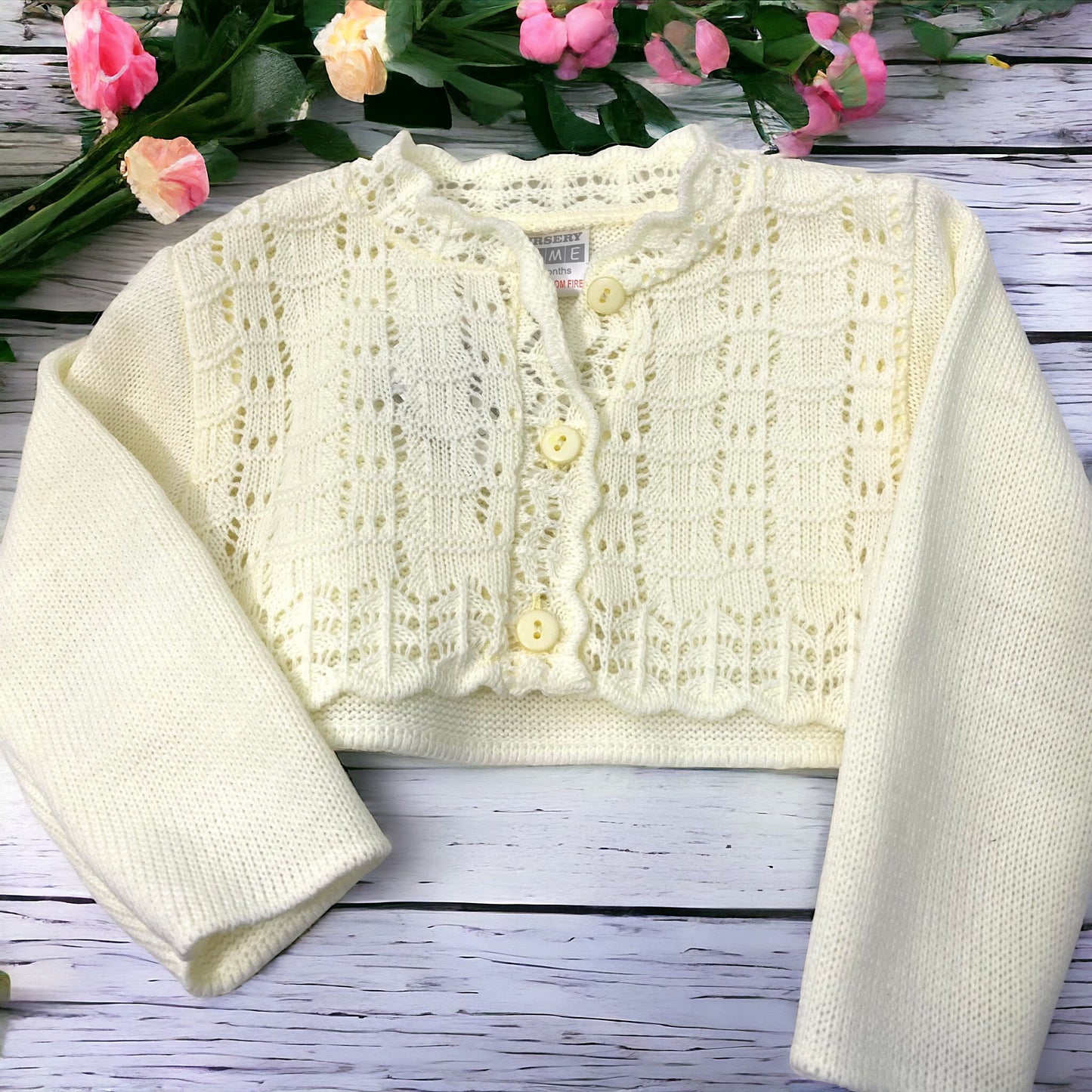 Yellow knitted baby cardigan