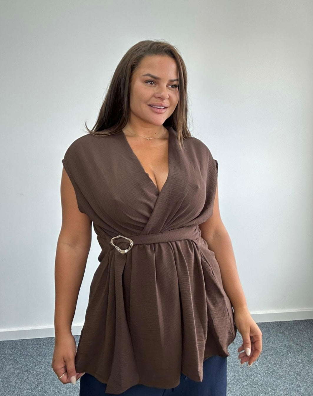 Curve wrap front sleeveless peplum top with buckle detail - Brown