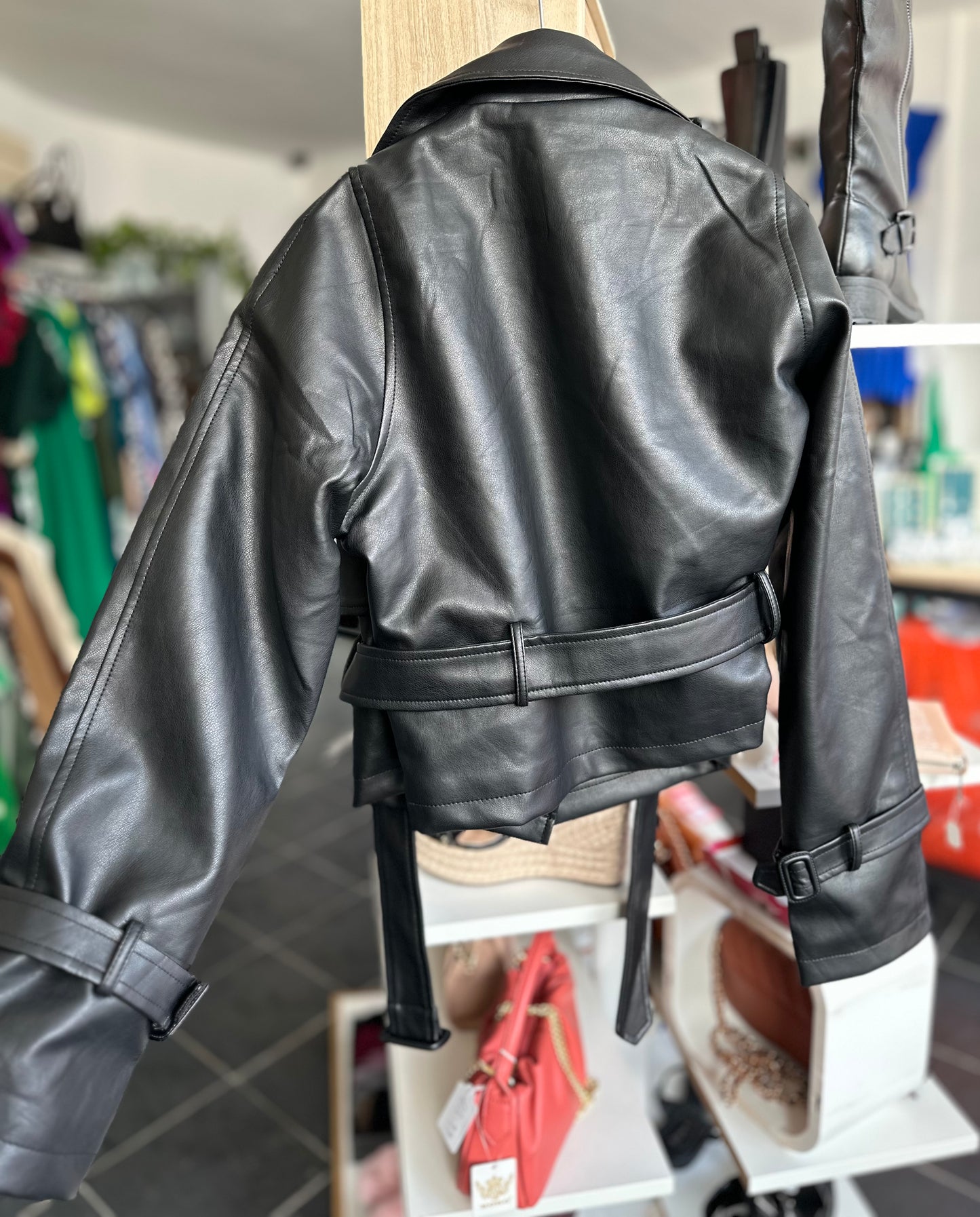 Black faux leather belted jacket