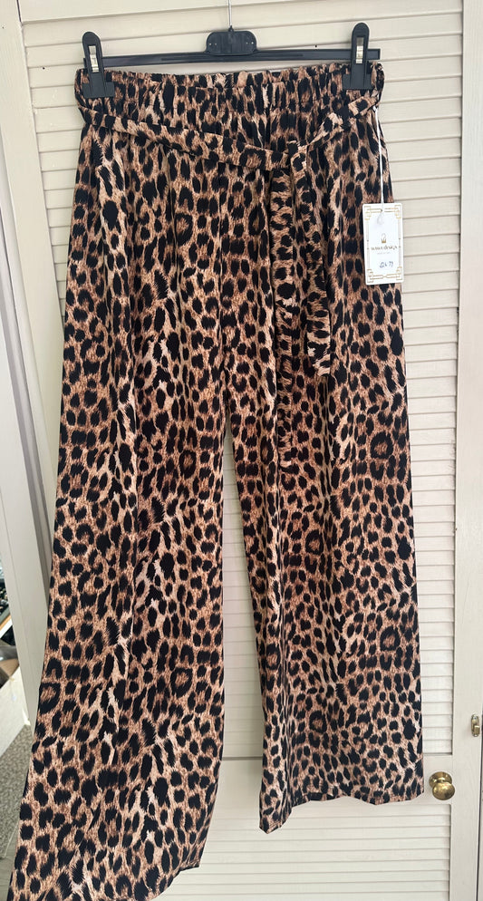 Curve fit leopard print elasticated trousers