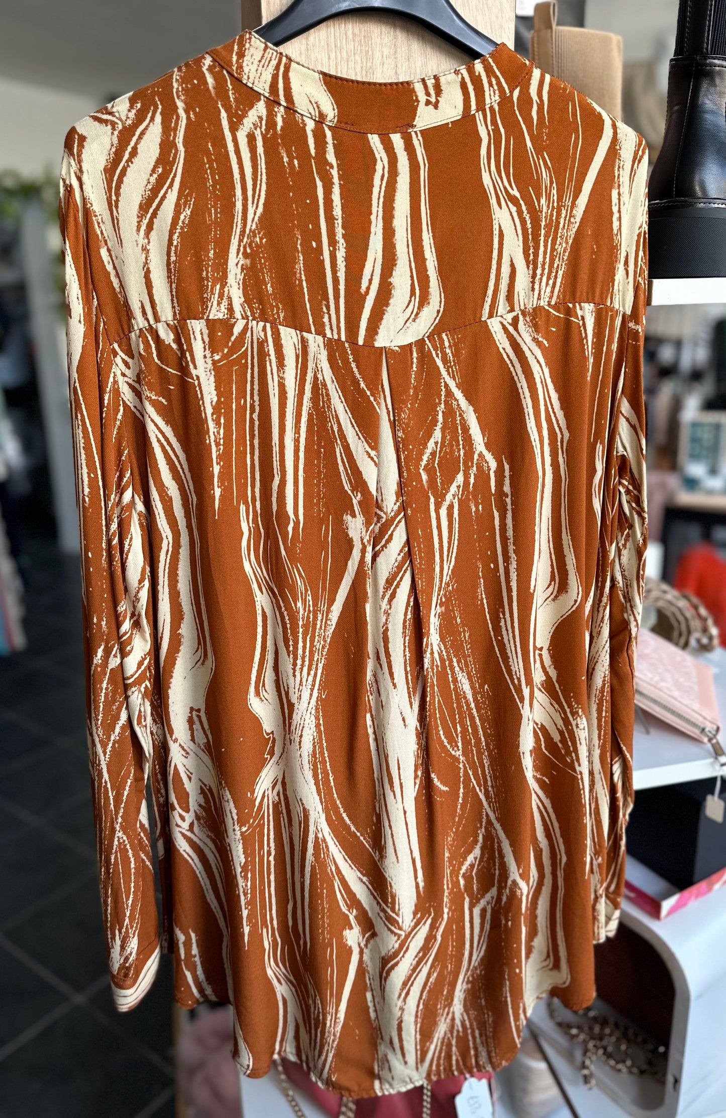 Cinnamon abstract print long sleeve blouse