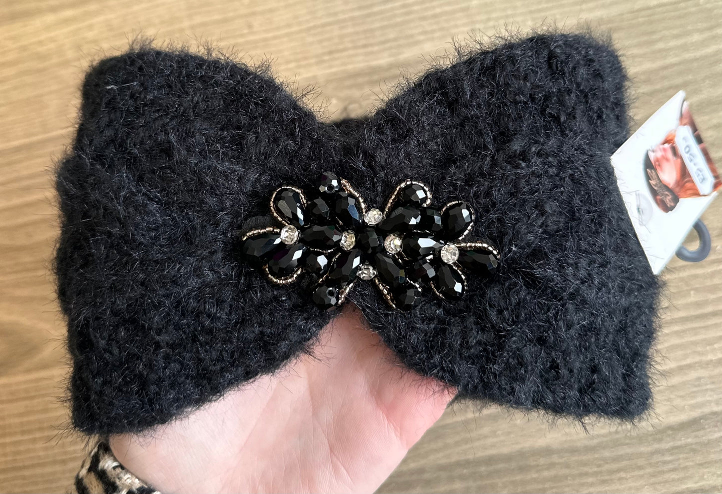 Black headband with black gem detail