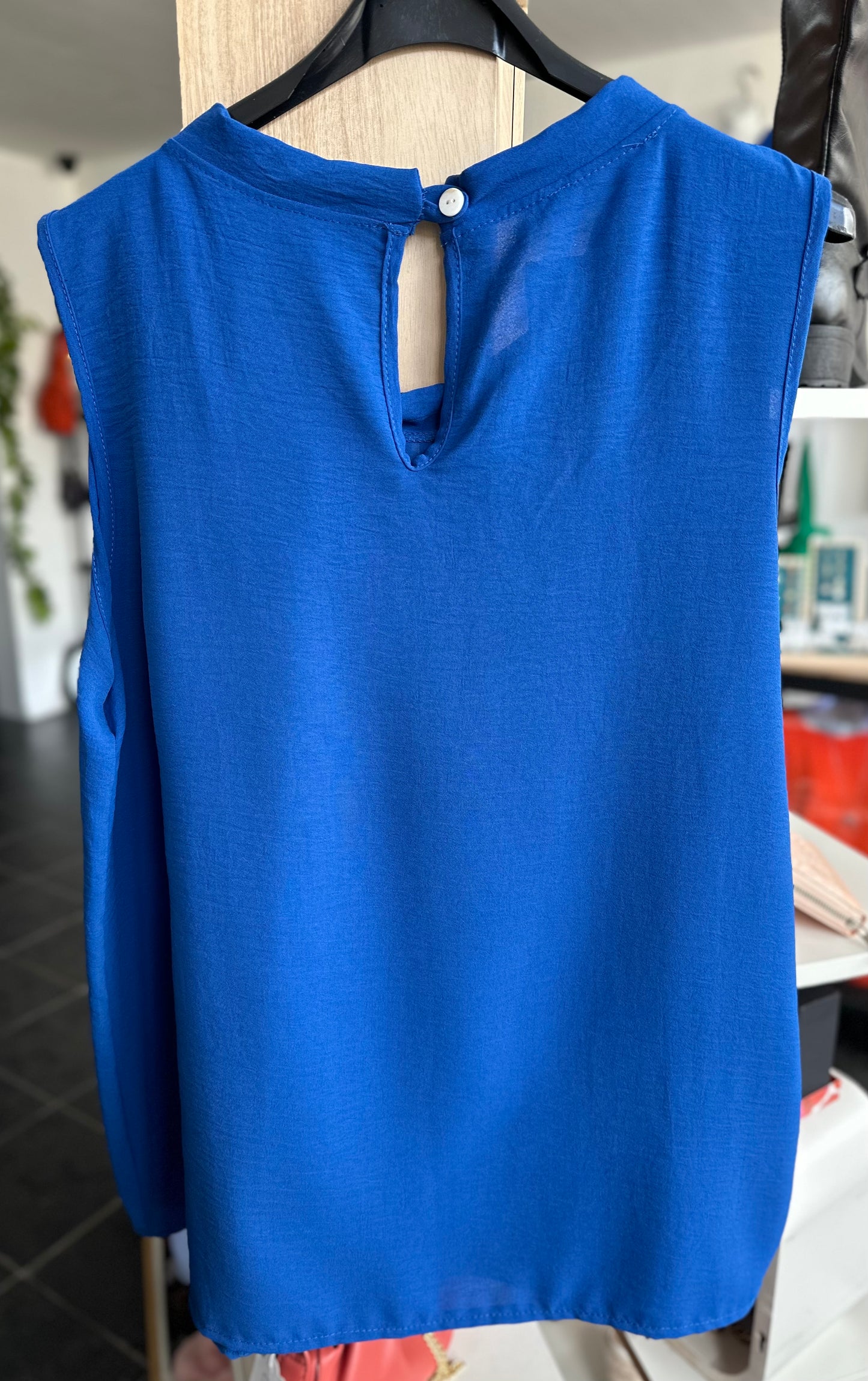 Royal blue sleeveless pleated front top