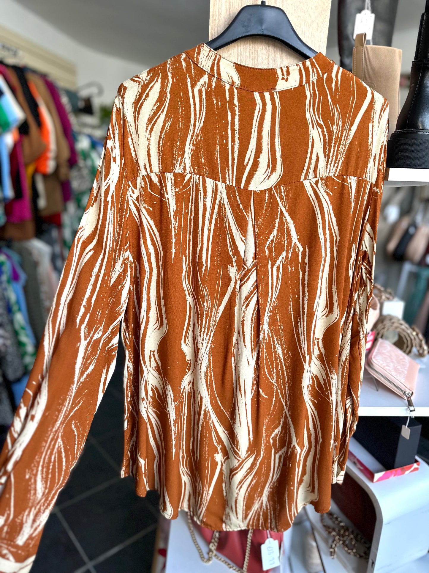 Cinnamon abstract print long sleeve blouse