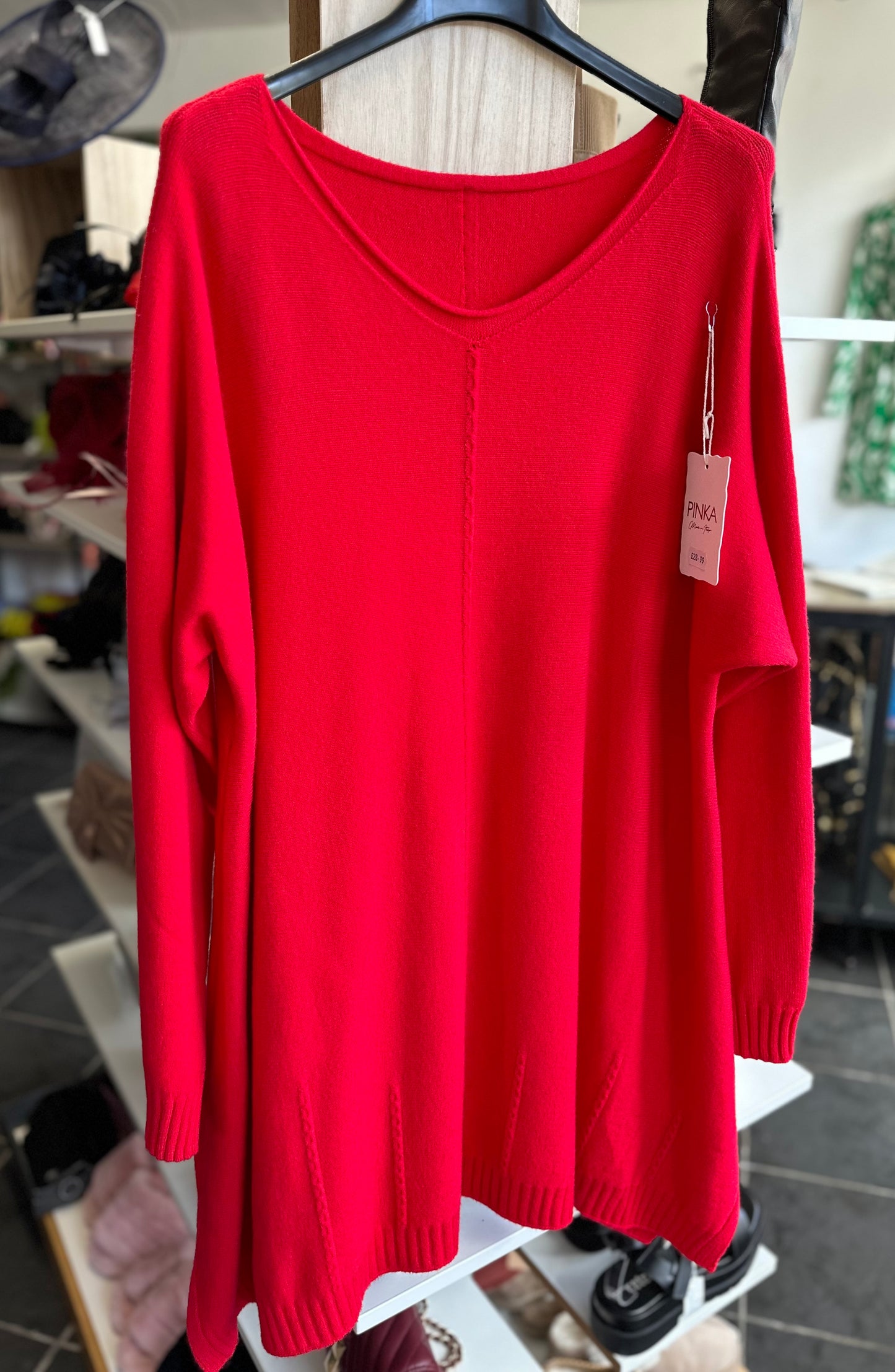 Red long length knitted jumper