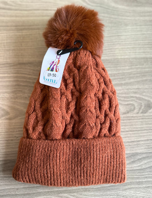 Burnt orange knitted bobble hat