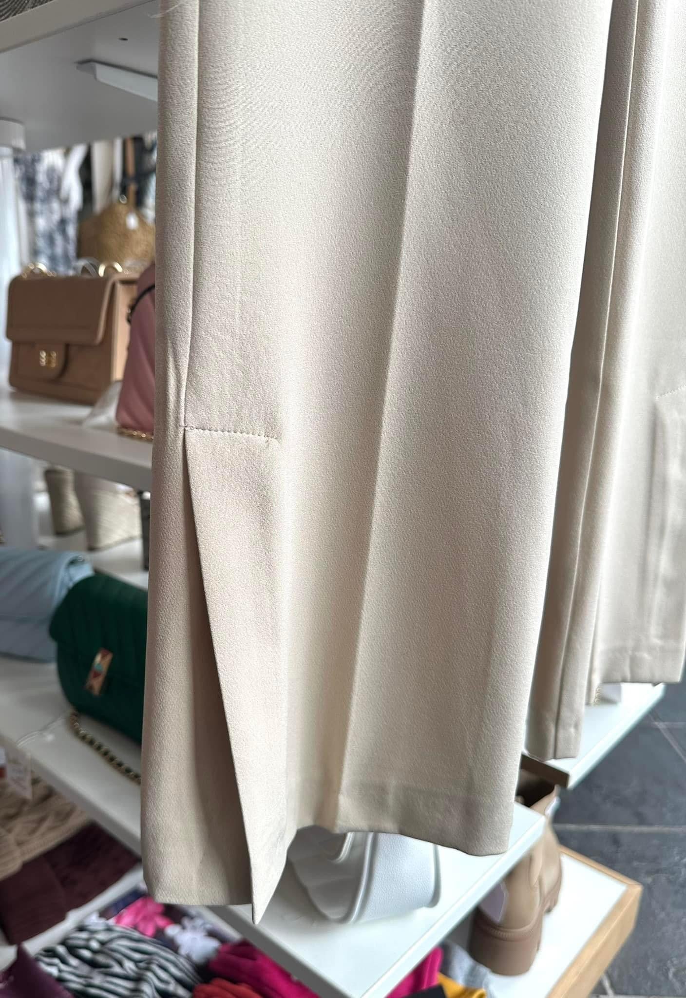 Cream high waisted split hem trousers