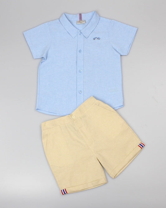 Light blue car logo shirt and beige shorts